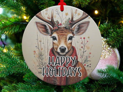 Festive deer ornament with botanical foliage, holly berries, pressed-flower styling, and seasonal Happy Holidays text.