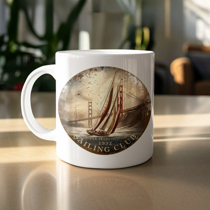 White 11oz San Francisco Sailing Club Mug featuring a classic sailing yacht, Golden Gate Bridge and circular 1932 badge.