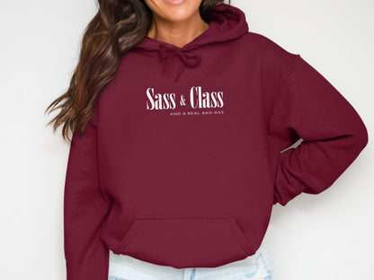 Maroon Sass and Class hoodie with elegant script, warm fleece interior, and versatile unisex pullover style.