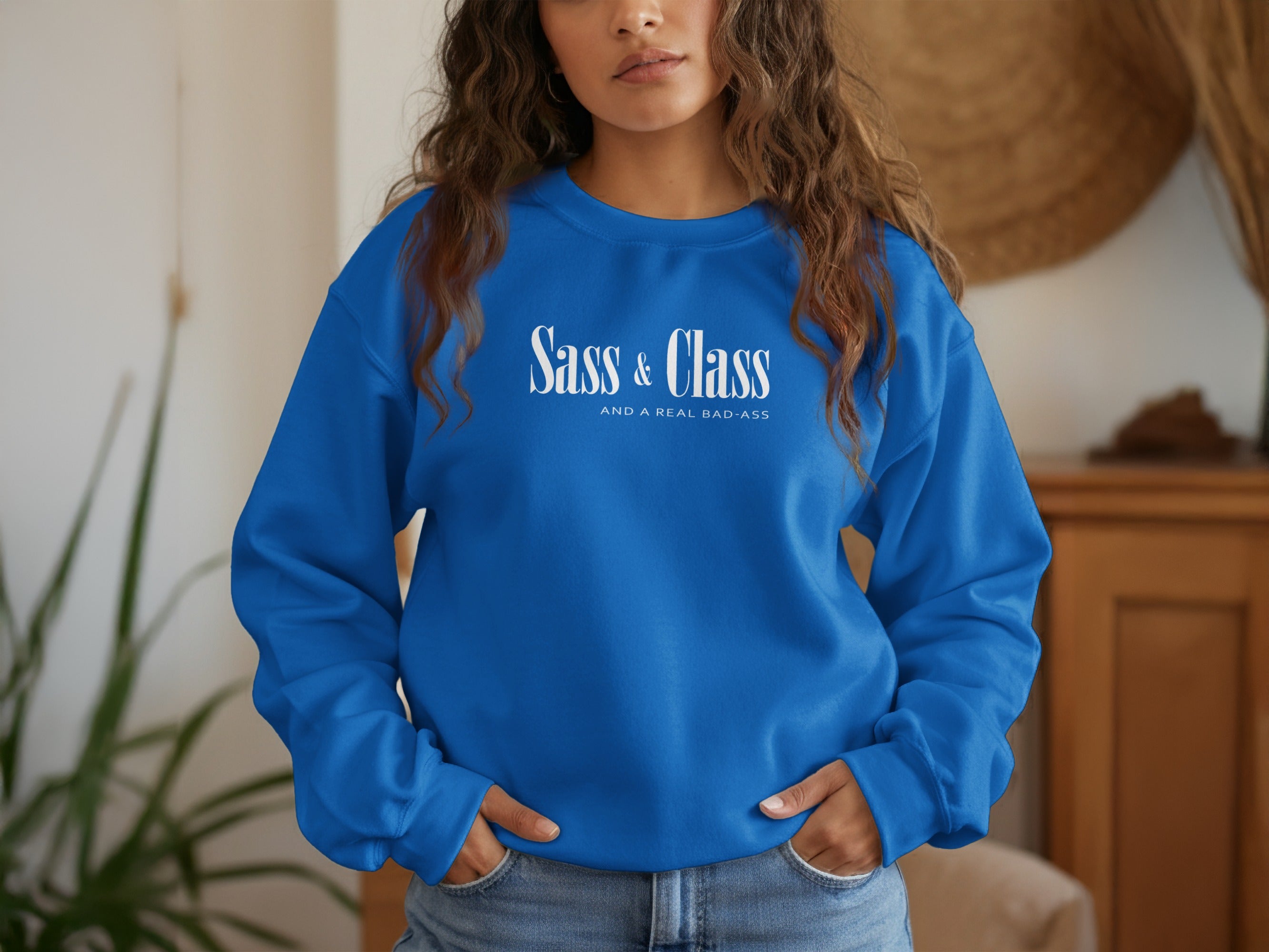 Royal Blue Sass and Class sweatshirt featuring stacked typographic composition with bold serif headline and uppercase text beneath.