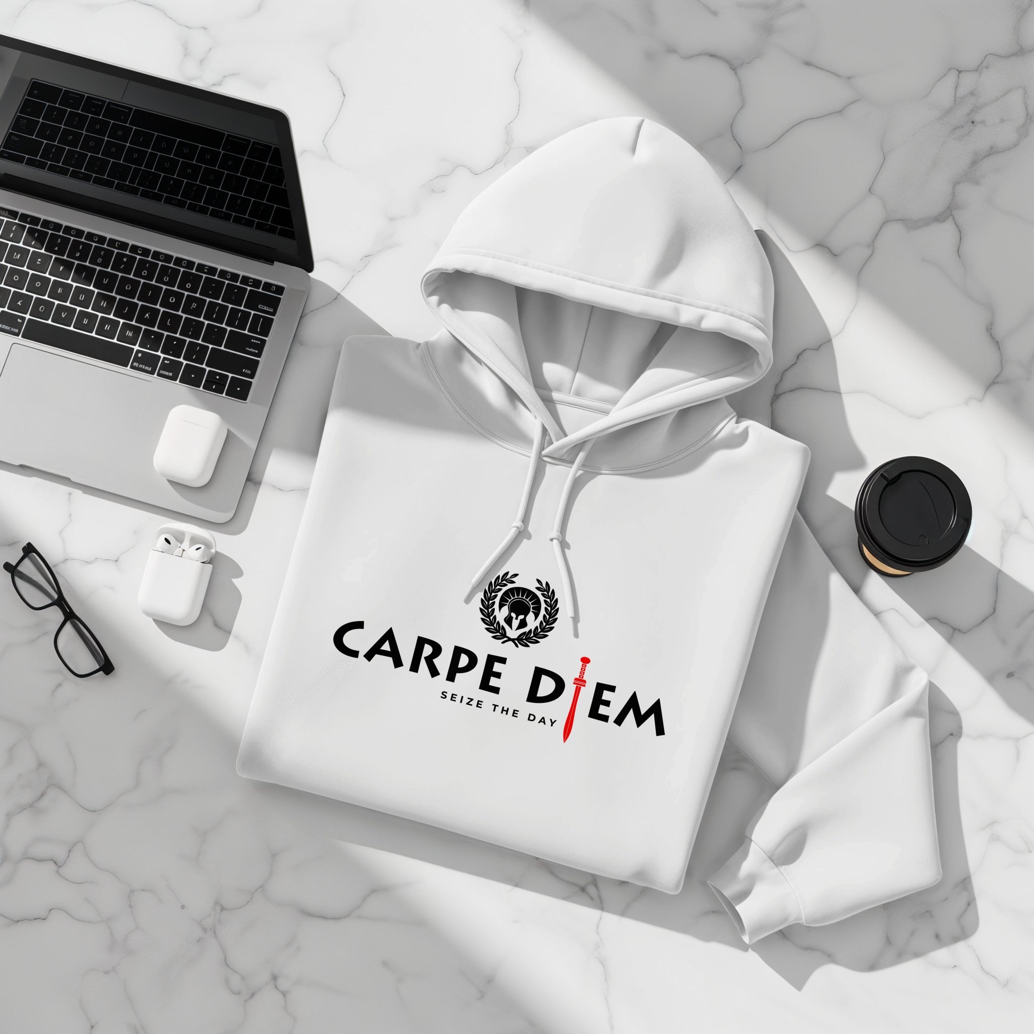 White Seize the Day hoodie folded showing Roman helmet graphic, laurel wreath, red gladius detail, and black typography print at centre-chest.