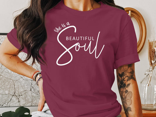 She is a Beautiful Soul T-shirt in soft cotton, with a crew neck and short sleeves. Available in multiple colours.