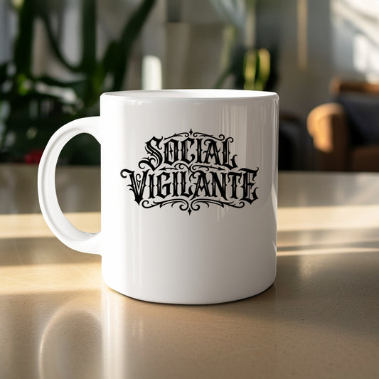 11oz Social Vigilante Mug featuring bold Victorian blackletter lettering with ornate flourishes and a decorative border.