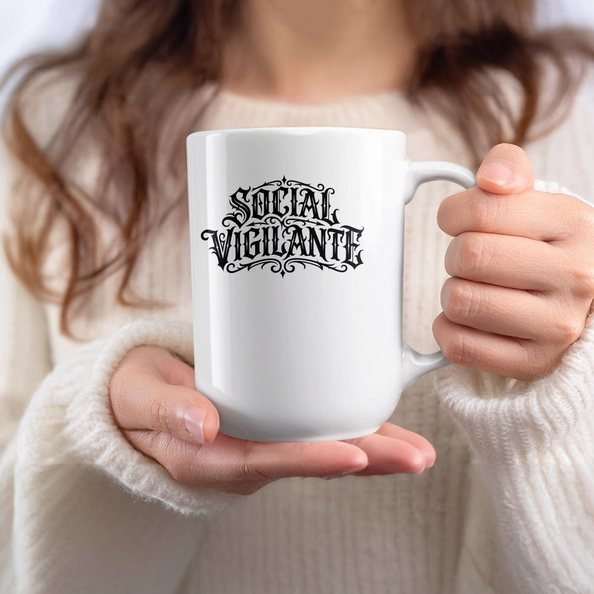 Handheld 15oz Social Vigilante Mug featuring gothic blackletter artwork with symmetrical ornamental flourishes.