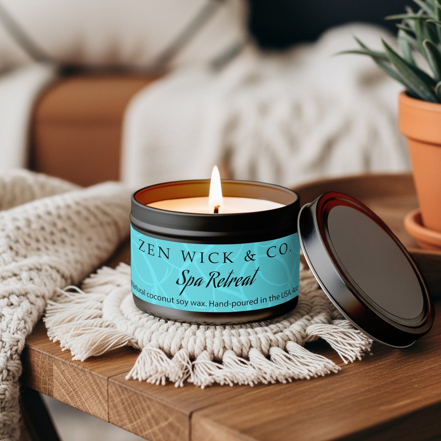 Spa retreat scented tin candle 4oz styled on coffee table adding a fresh relaxing touch to everyday living space.