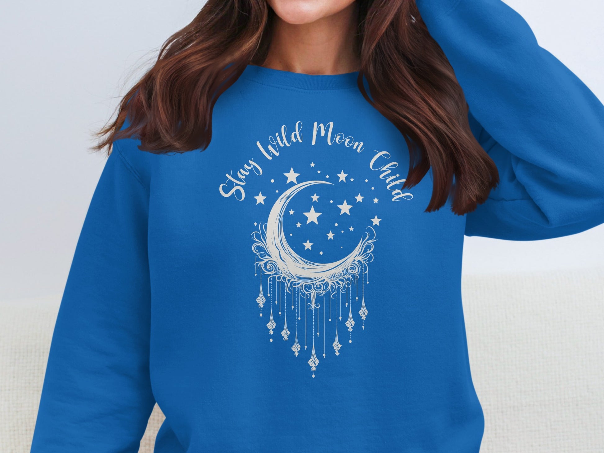 Royal blue Moon Child sweatshirt, soft fabric with whimsical celestial art, bohemian casual wear.