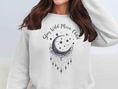 White Stay Wild Moon Child pullover with mystical moon print, warm and cozy, casual boho essential.