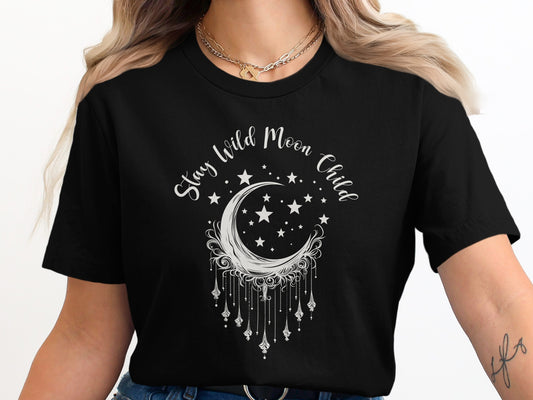 Black Stay Wild Moon Child T-Shirt with boho white moon graphic, soft cotton fabric, and relaxed celestial style fit.