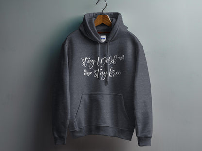 Dark Heather Grey Stay Wild Stay Free Hoodie featuring free-spirited Stay Wild script lettering with delicate butterfly outlines.