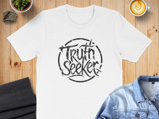 Truth Seeker unisex graphic t-shirt with bold minimalist text, soft cotton fabric, crew neck, and classic relaxed fit.