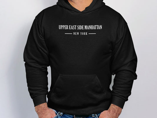 Black Upper East Side Manhattan Hoodie with bold graphic design, unisex pullover fit, & long sleeves for versatile styling