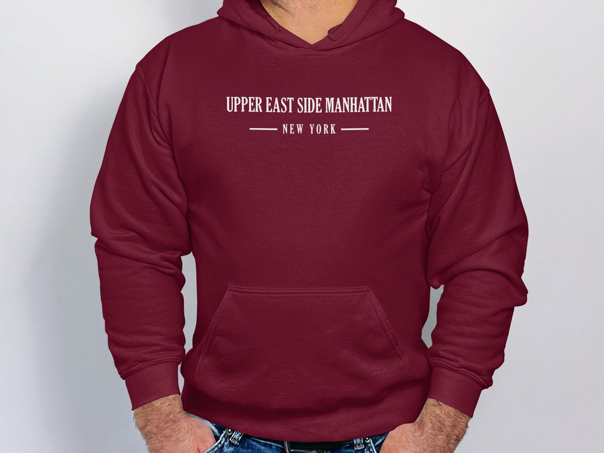Maroon Upper East Side Manhattan Hoodie with printed design, long sleeves, & unisex relaxed fit for effortless layering