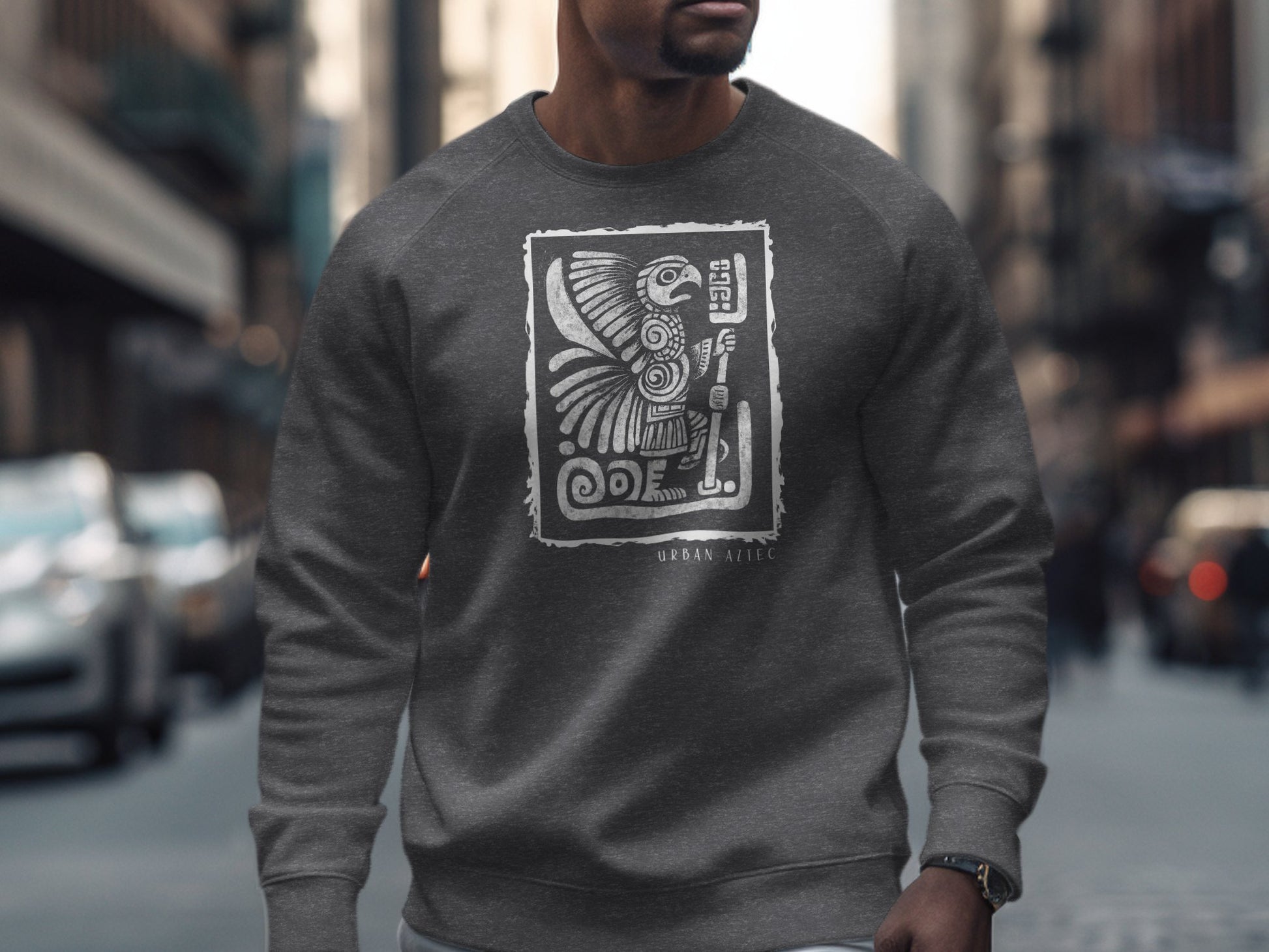 Dark heather Urban Aztec Sweatshirt Edition 1 with layered bird motif surrounded by textured Aztec-style white frame.