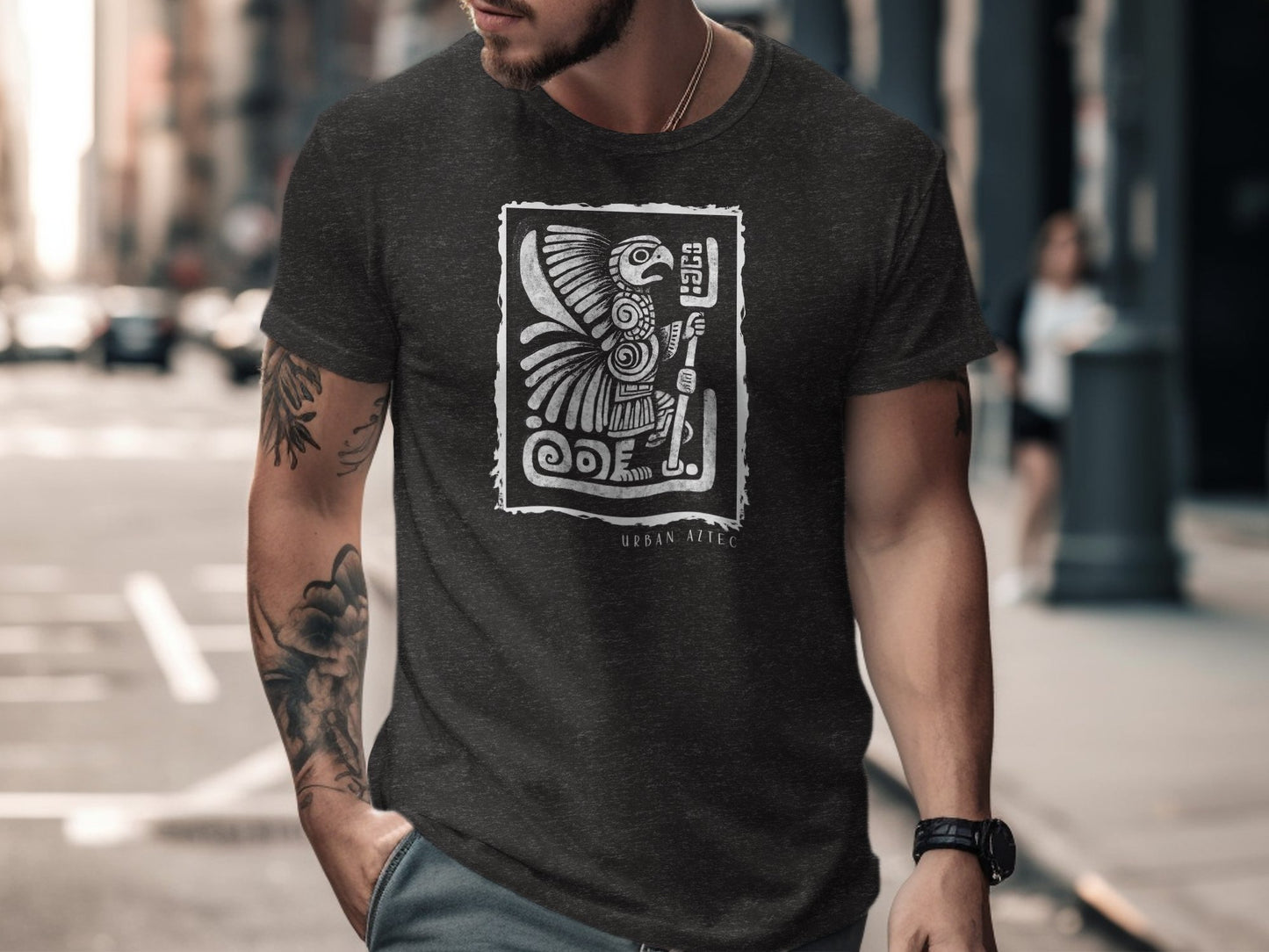 Dark heather grey Urban Aztec Edition 1 t-shirt with codex‑style eagle warrior artwork framed in distressed edges.