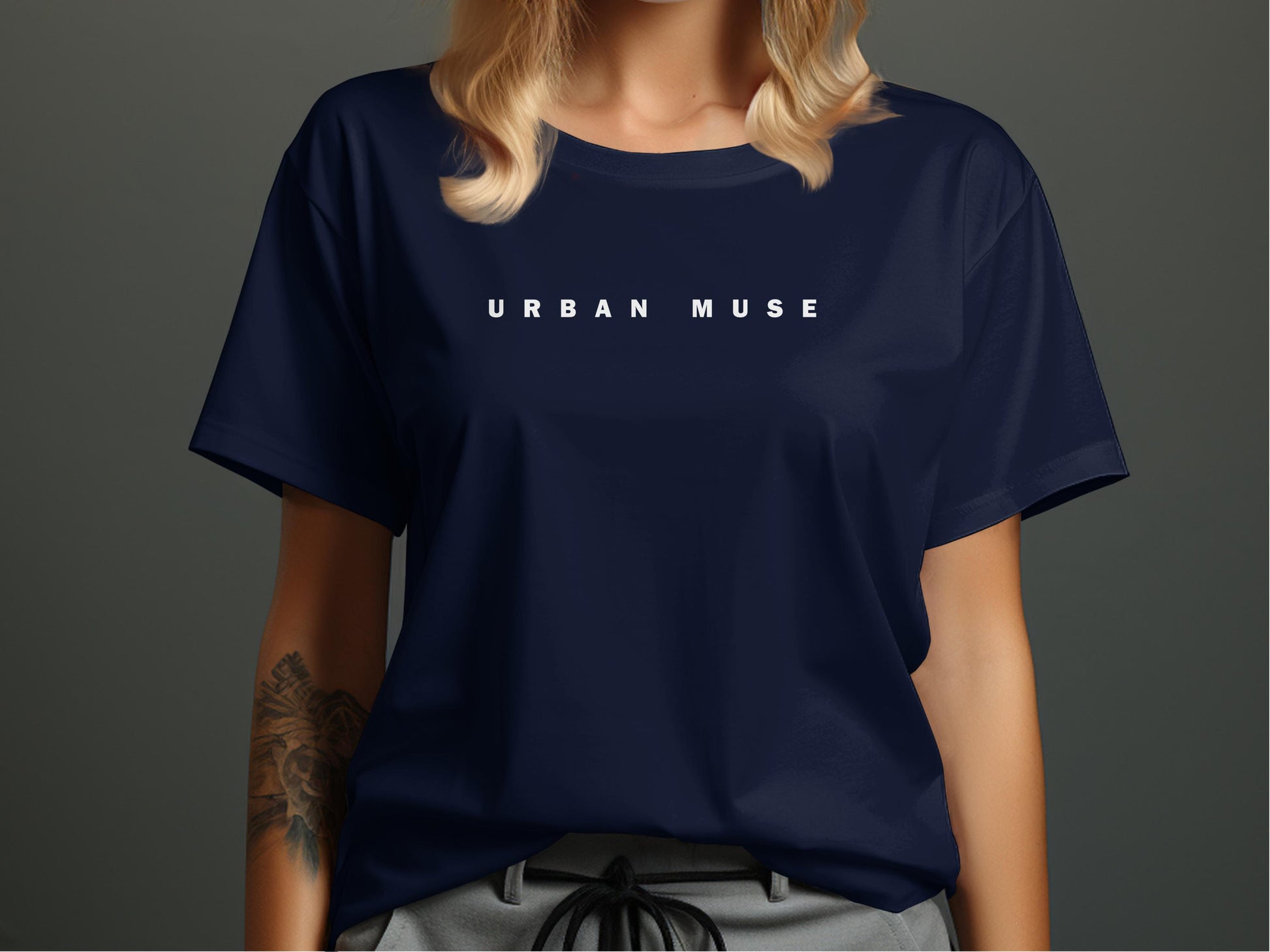 Navy Urban Muse T-Shirt featuring the minimalist widely spaced typographic design in clean white lettering across the chest.