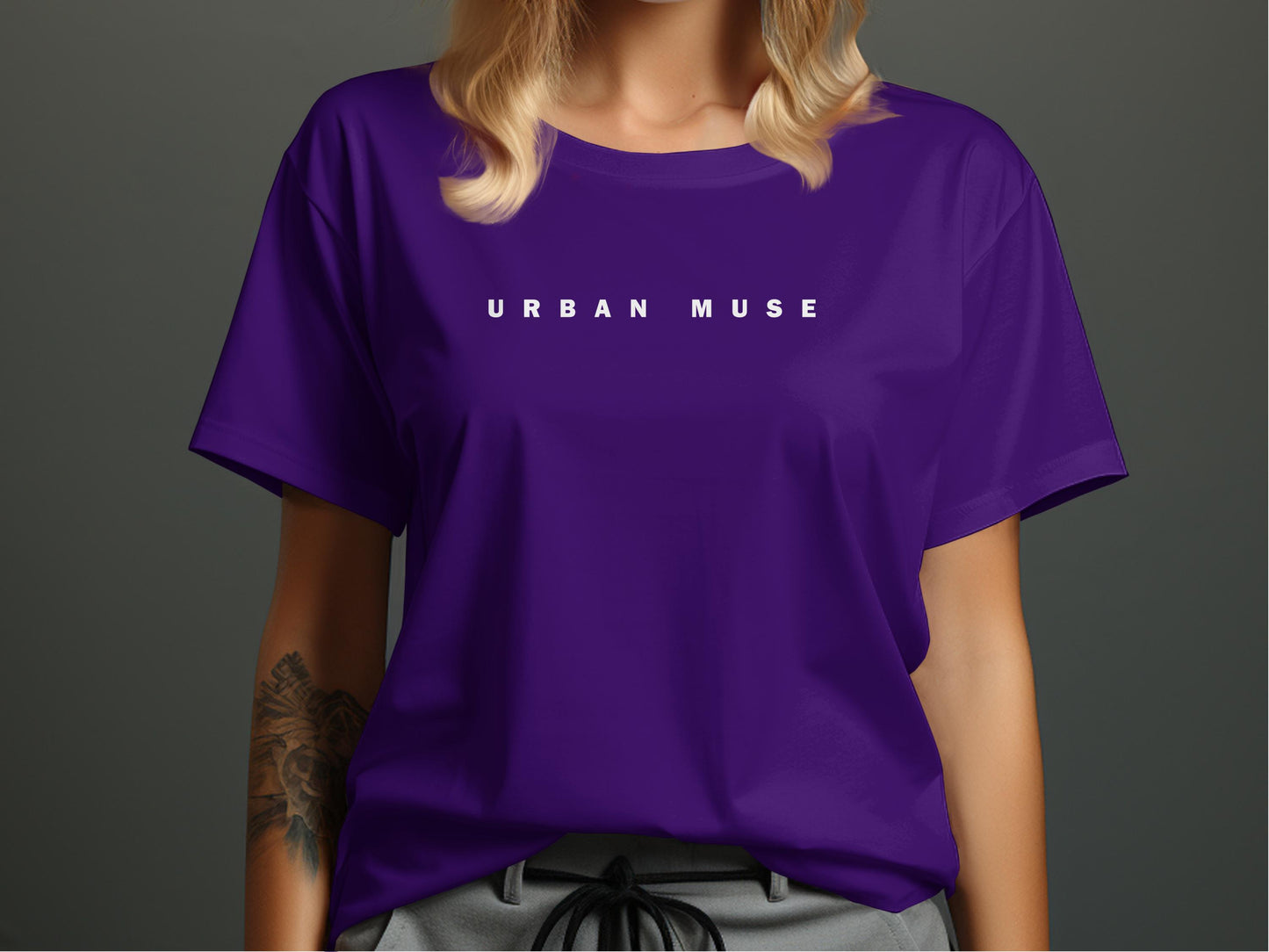Purple Urban Muse T-Shirt featuring the clean, minimalist widely spaced black typography on the centre chest.