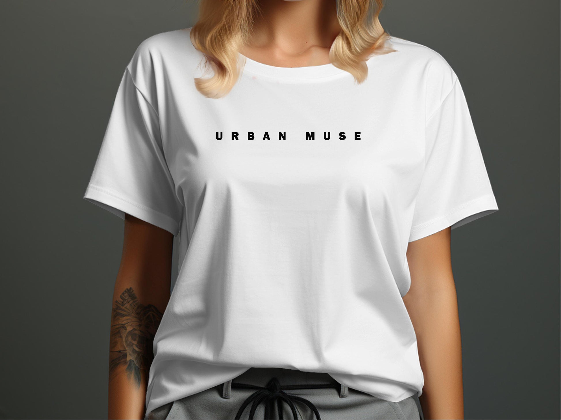 White Urban Muse T-Shirt featuring black typography, offering a refined editorial-inspired look.