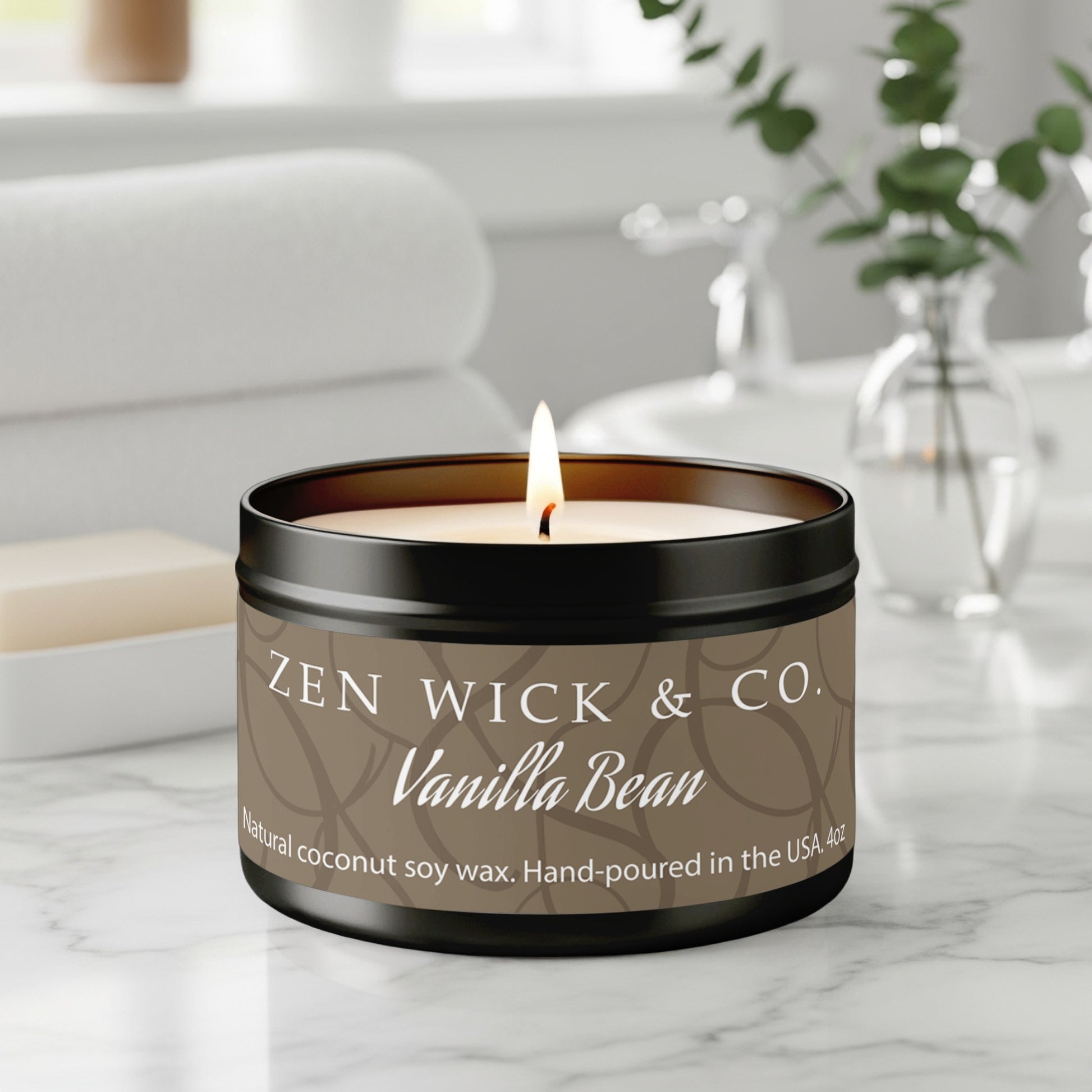 Vanilla bean scented tin candle 4oz burning on table with warm glow creating a cozy relaxing ambiance.