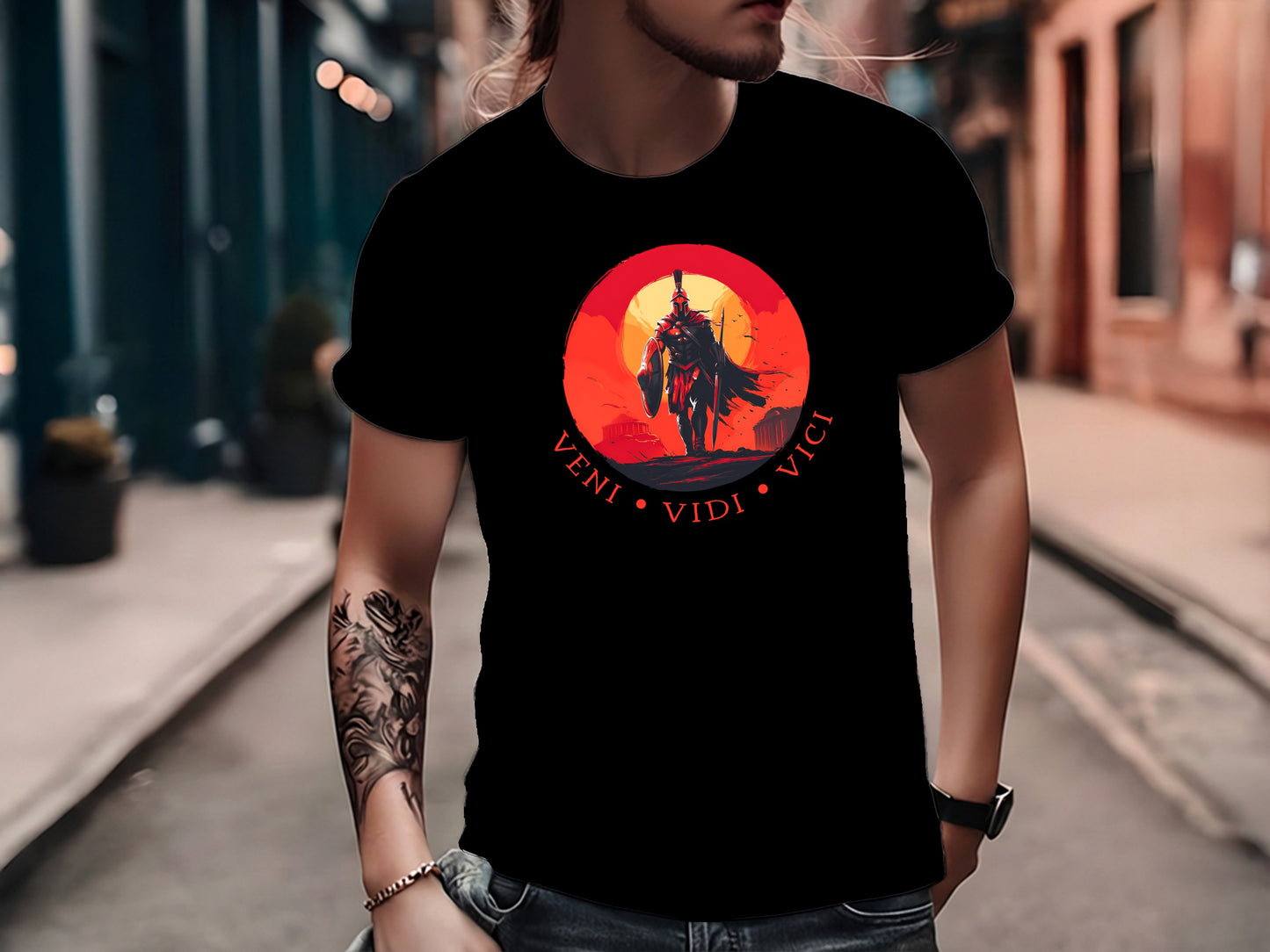 Black Veni Vidi Vici T-shirt with centred Roman warrior artwork and bold Latin circular red typography.
