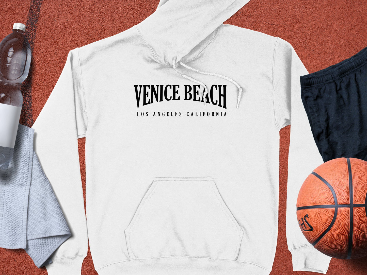 White Venice Beach Hoodie featuring bold graphic, long sleeves, and a unisex relaxed fit for effortless layering