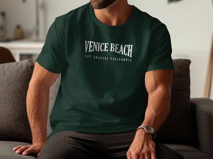Forest green Venice Beach tee with breathable cotton, relaxed fit, and chill coastal-style print.