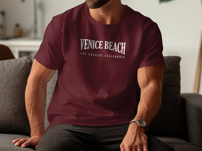 Maroon Venice Beach T-shirt with comfy cotton fabric and bold beach-themed front lettering.