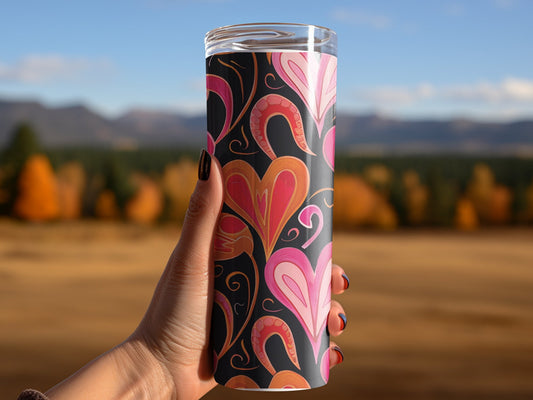 Artistic 20oz heart tumbler with coral and blush hearts, layered contour lines, and decorative flourishes.
