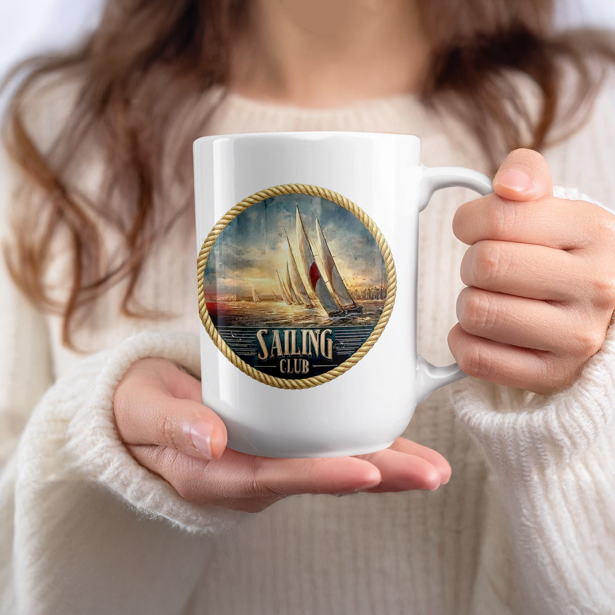 Lady holding Sailing Club 15oz ceramic mug with classic vintage sailing yacht and rope-bordered design.