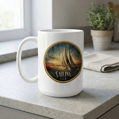 Vintage Sailing Club 15oz ceramic mug by window featuring dramatic sailing yachts and coastal sky in circular design.