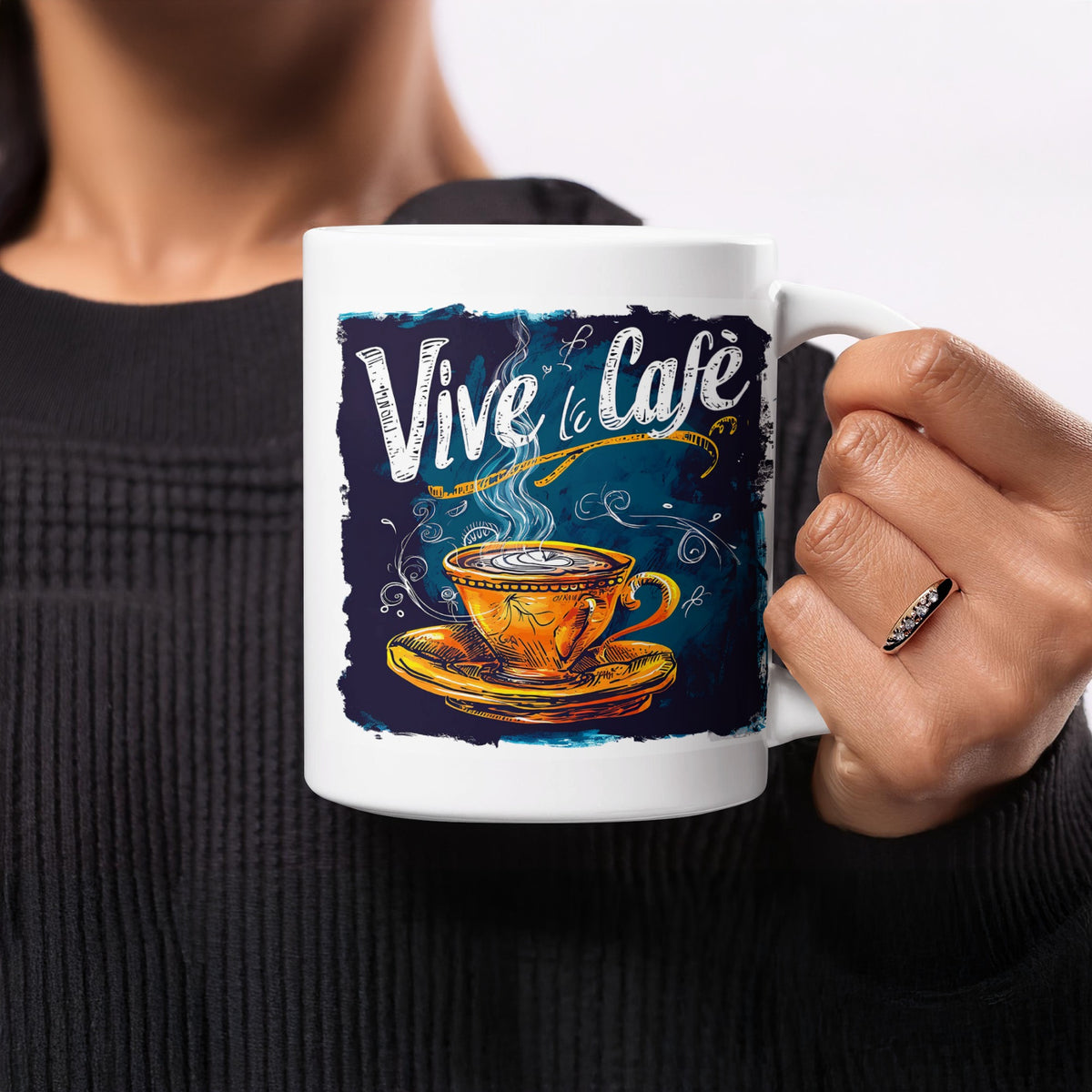 11oz Vive le Cafe Chalk Art Mug held in hand, showing its compact size and colourful illustrated cafe design.
