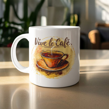 Vive le Cafe Watercolour ceramic coffee mug on a table, highlighting the hand-drawn cup, warm watercolour tones and flowing script.