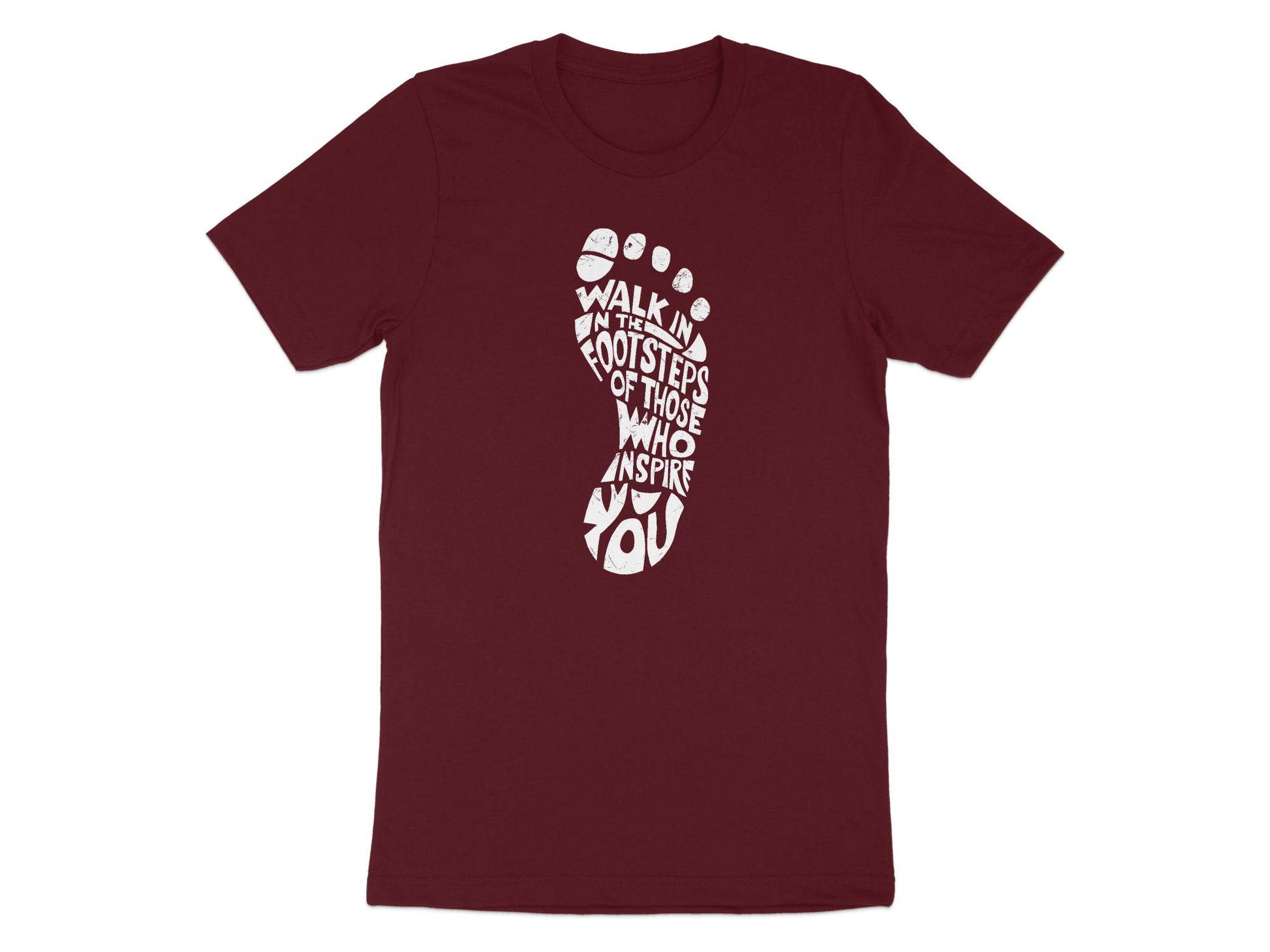 Maroon Walk In The Footsteps T-shirt with short sleeves, side-seamed body, and purpose-driven print.