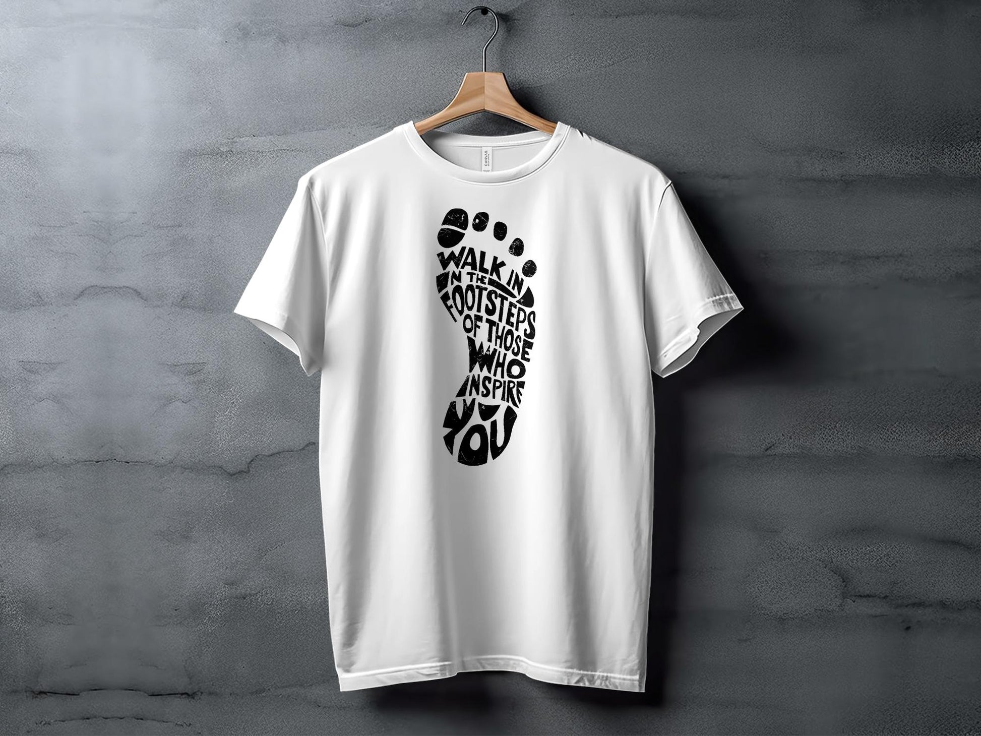 Walk In The Footsteps T-shirt with soft cotton fabric, classic fit, short sleeves, and motivational front print.