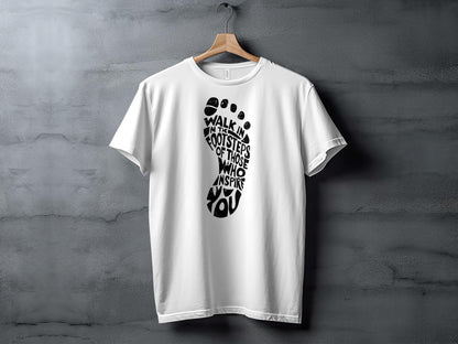 Walk In The Footsteps T-shirt with soft cotton fabric, classic fit, short sleeves, and motivational front print.