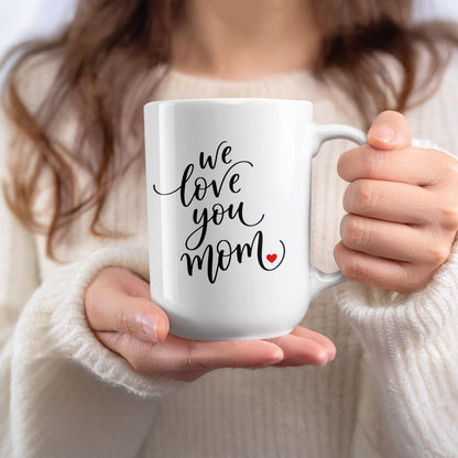 Lady holding 15oz We Love You Mom mug, perfect for larger drinks and meaningful gift moments.