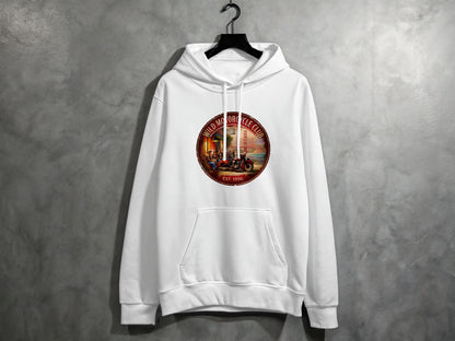 Wild Motorcycle Club white hoodie showcasing a red motorcycle, three bikers outside a roadside café and a misty San Francisco backdrop.