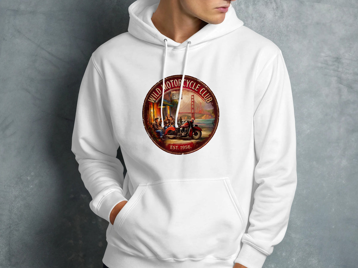 White Wild Motorcycle Club Hoodie worn in a lifestyle setting, displaying the vintage motorcycle scene, warm red-brown tones and club lettering.