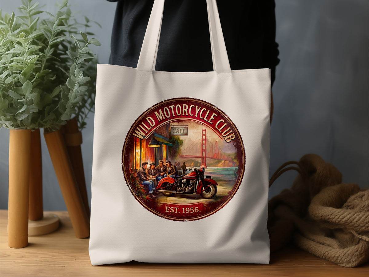 Wild Motorcycle Club Tote Bag in a lifestyle setting, highlighting the full San Francisco motorcycle-club graphic, atmospheric lighting and natural canvas.