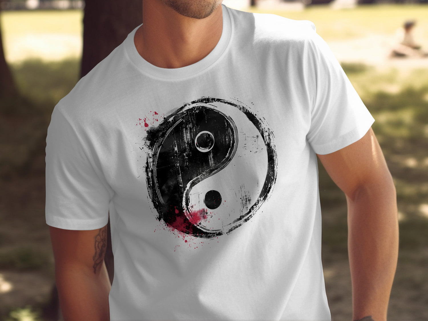 Yin Yang T-shirt in white with centre-chest brushstroke symbol and distressed monochrome artwork.