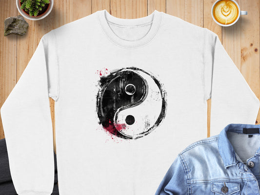 Unisex Yin Yang sweatshirt featuring a spiritual black and white symbol on soft cotton-blend fabric for balance.
